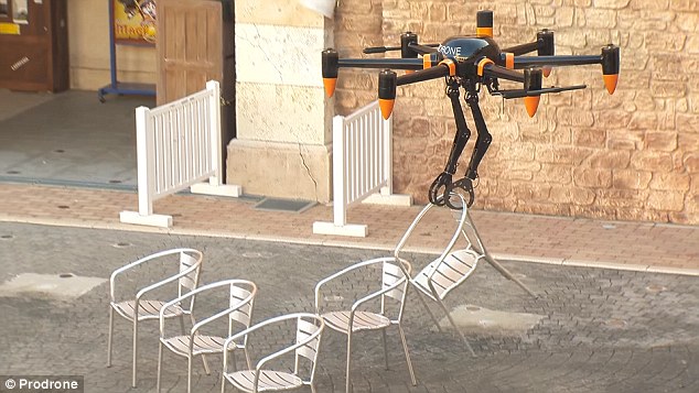 The World’s First Drone Equipped with Robotic Arms